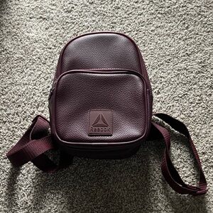 REEBOK CLASSIC MINI BACK PACK IN BURGUNDY